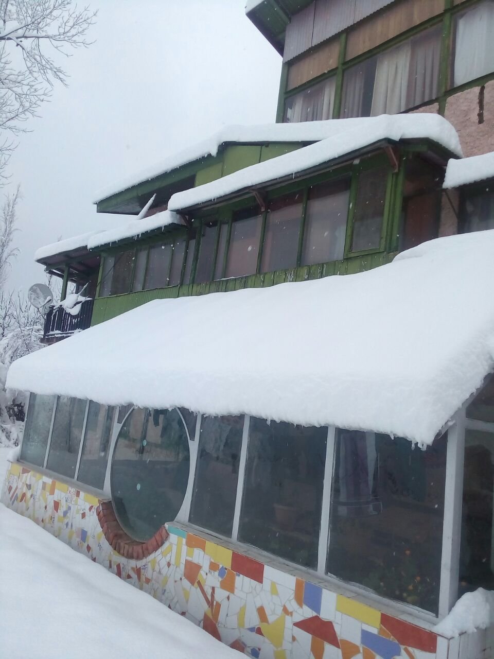 Snow-covered slopes near Manali in winter