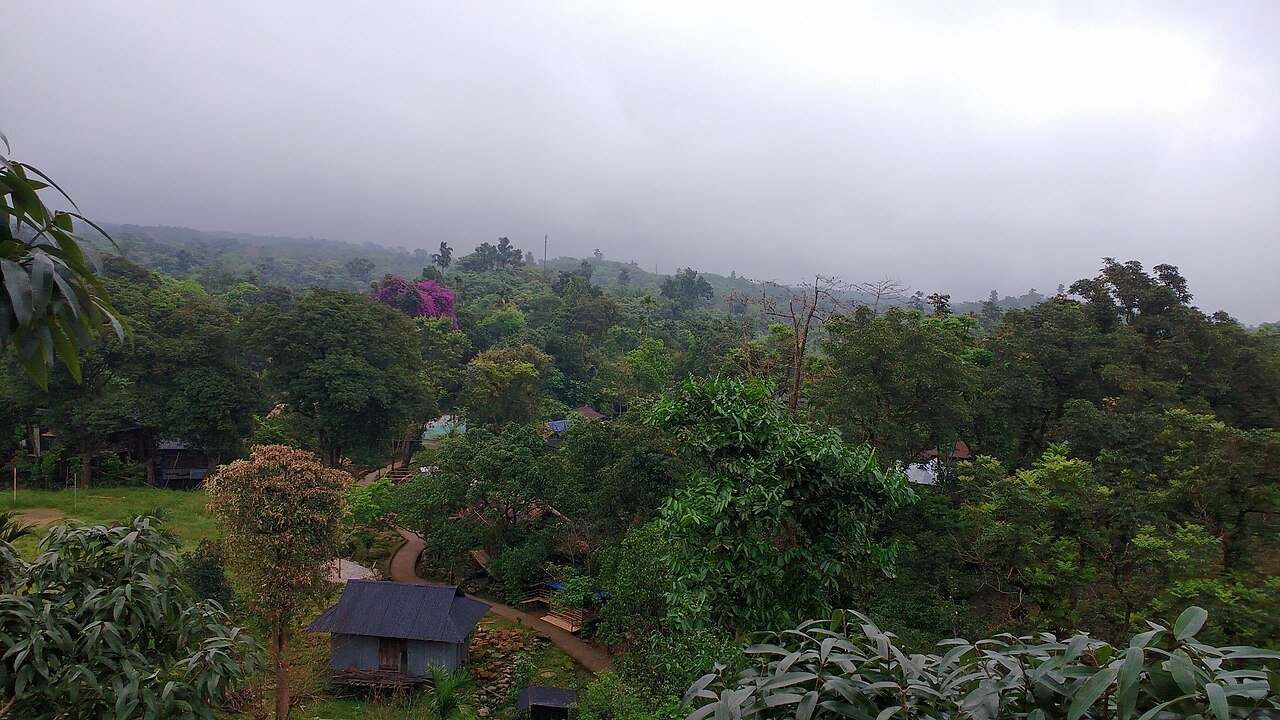 A village and clear river in Meghalaya