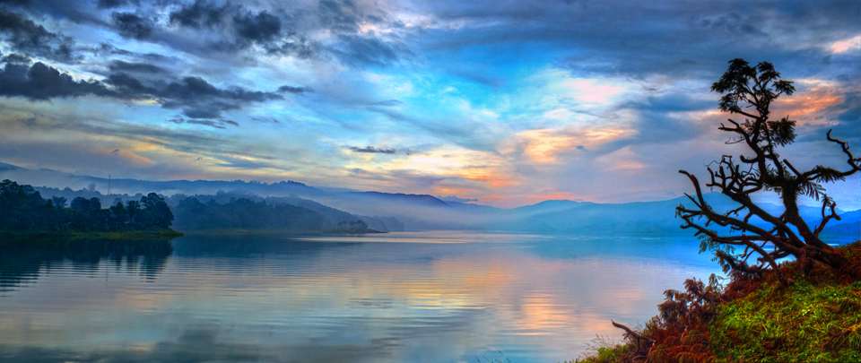 A lake and green hills in Meghalaya